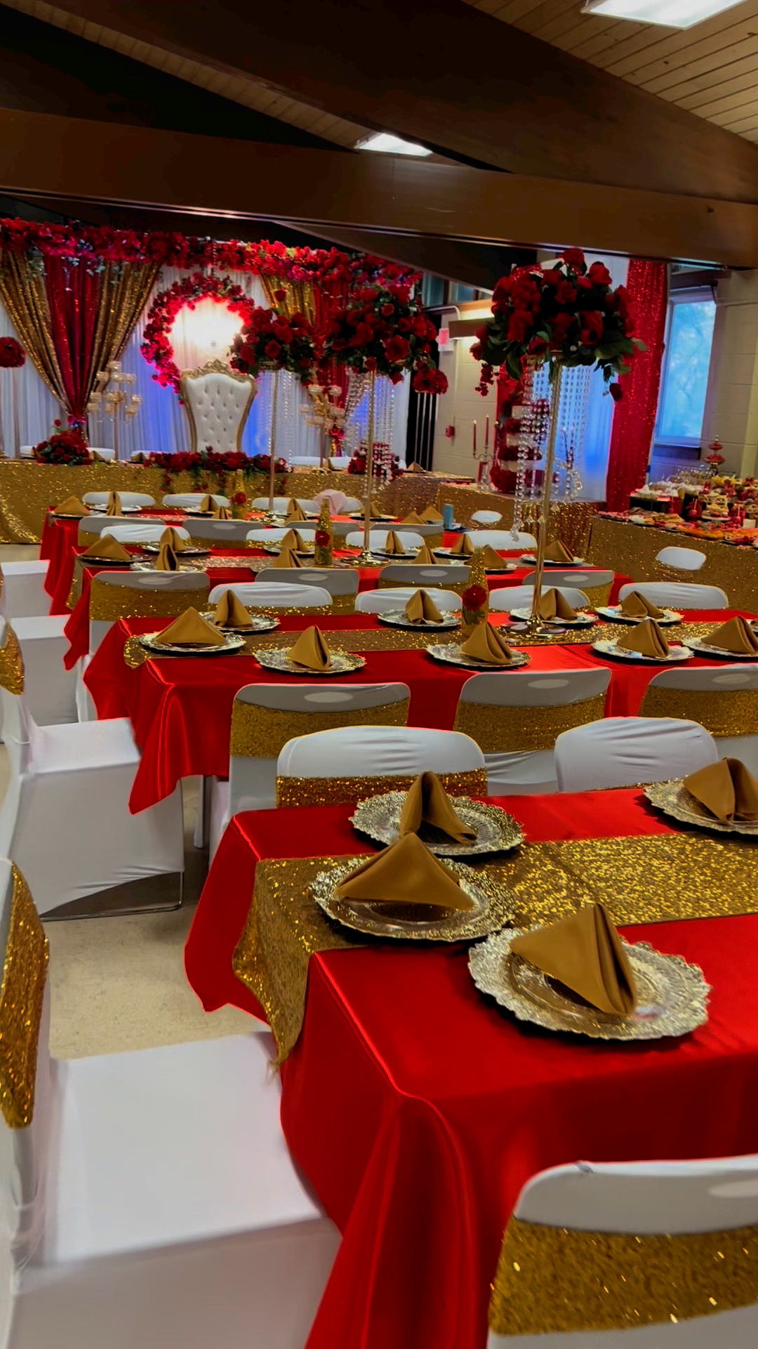 Quinceañera reception table decoration in pink and gold.